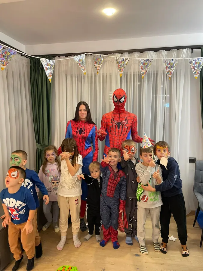 Kids' party with Spider-Man costumes and face painting